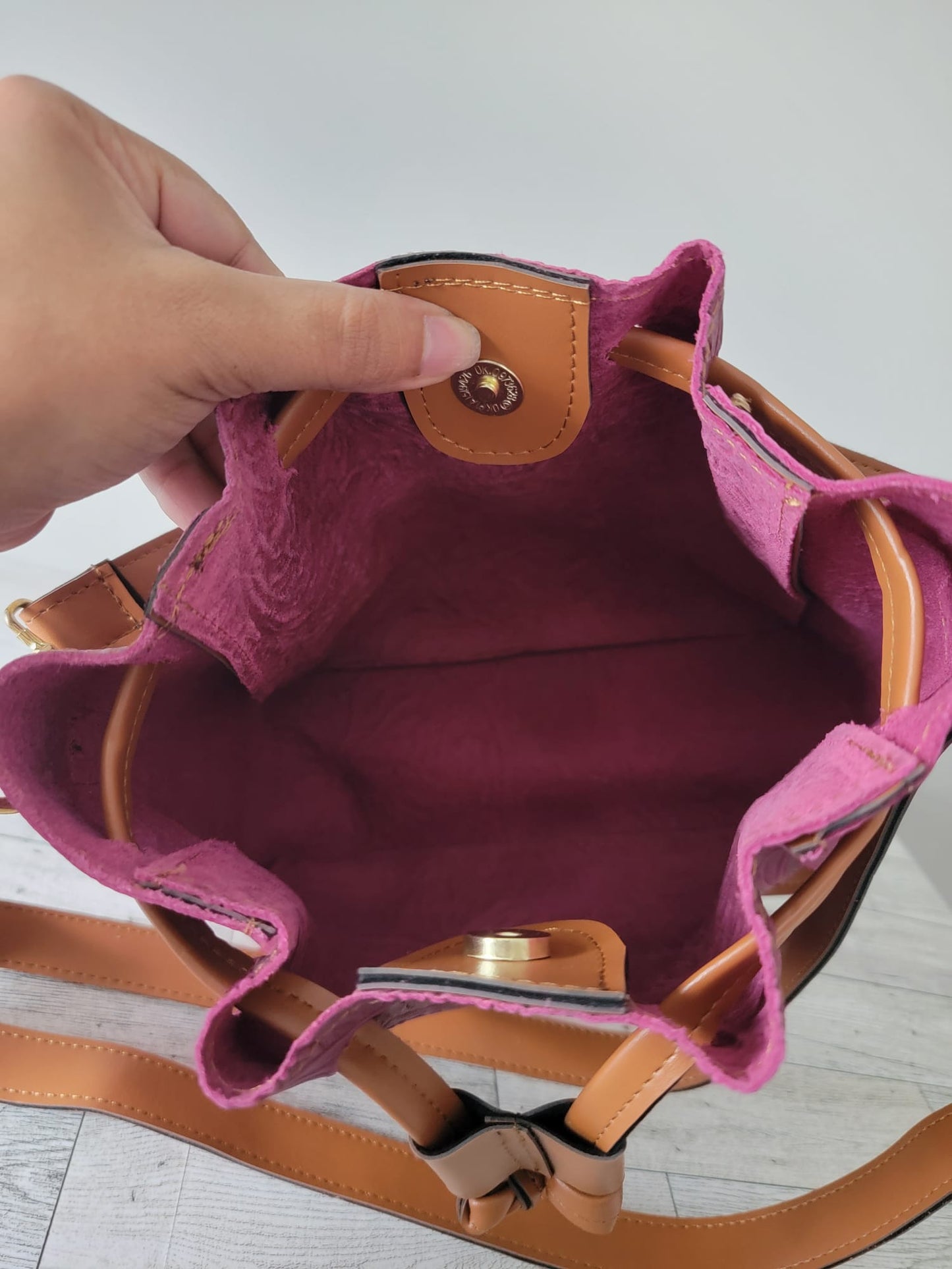 Embossed Leather Convertible Bucket Bag